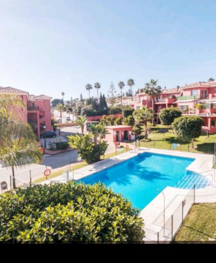 Apartamento Jardines De มานิลบา ภายนอก รูปภาพ