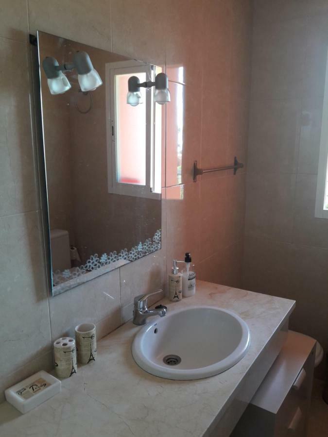 Apartamento Jardines De มานิลบา ภายนอก รูปภาพ